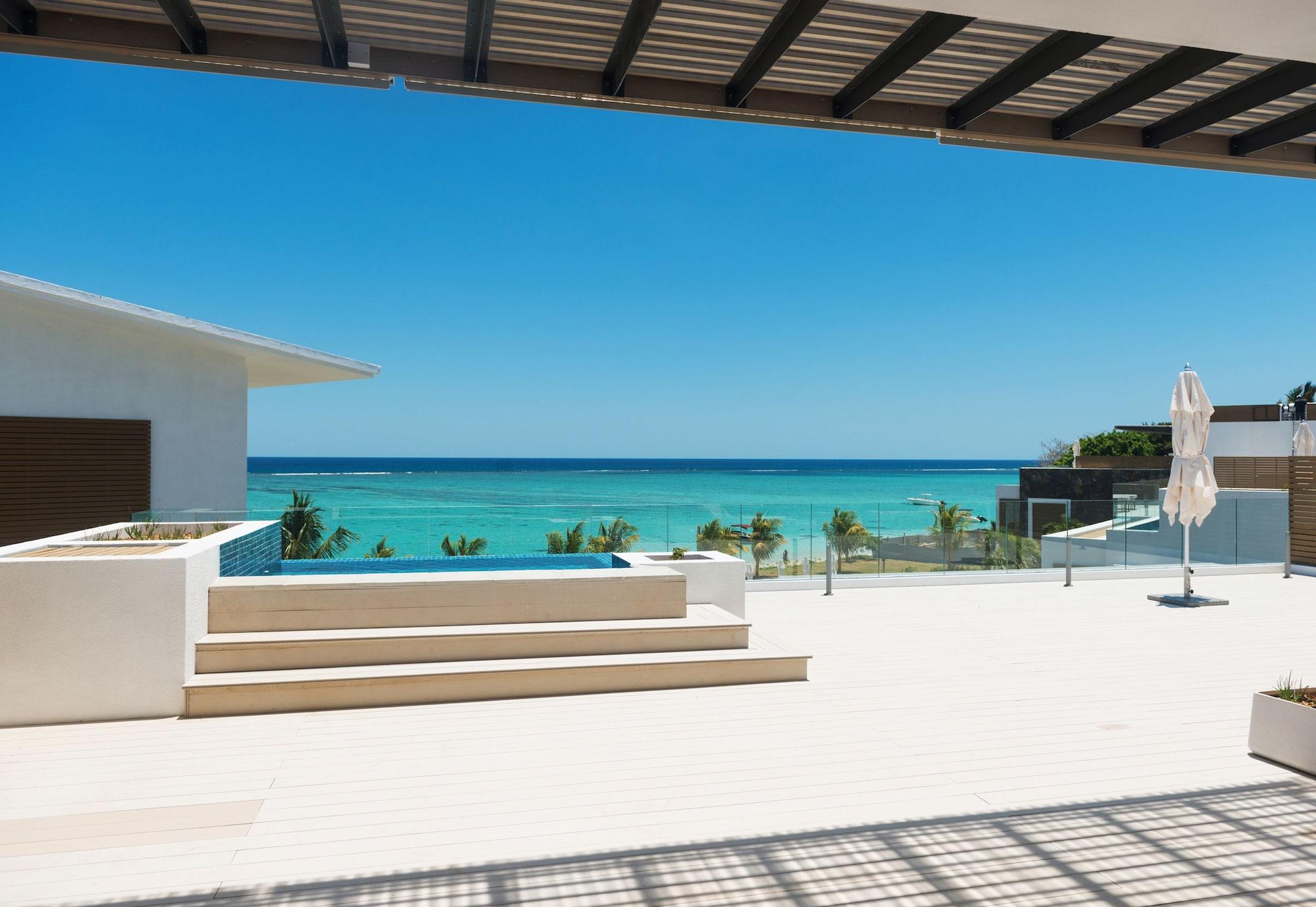 Cap Ouest: Luxury Beachfront Apartments Flic en Flac Luaran gambar