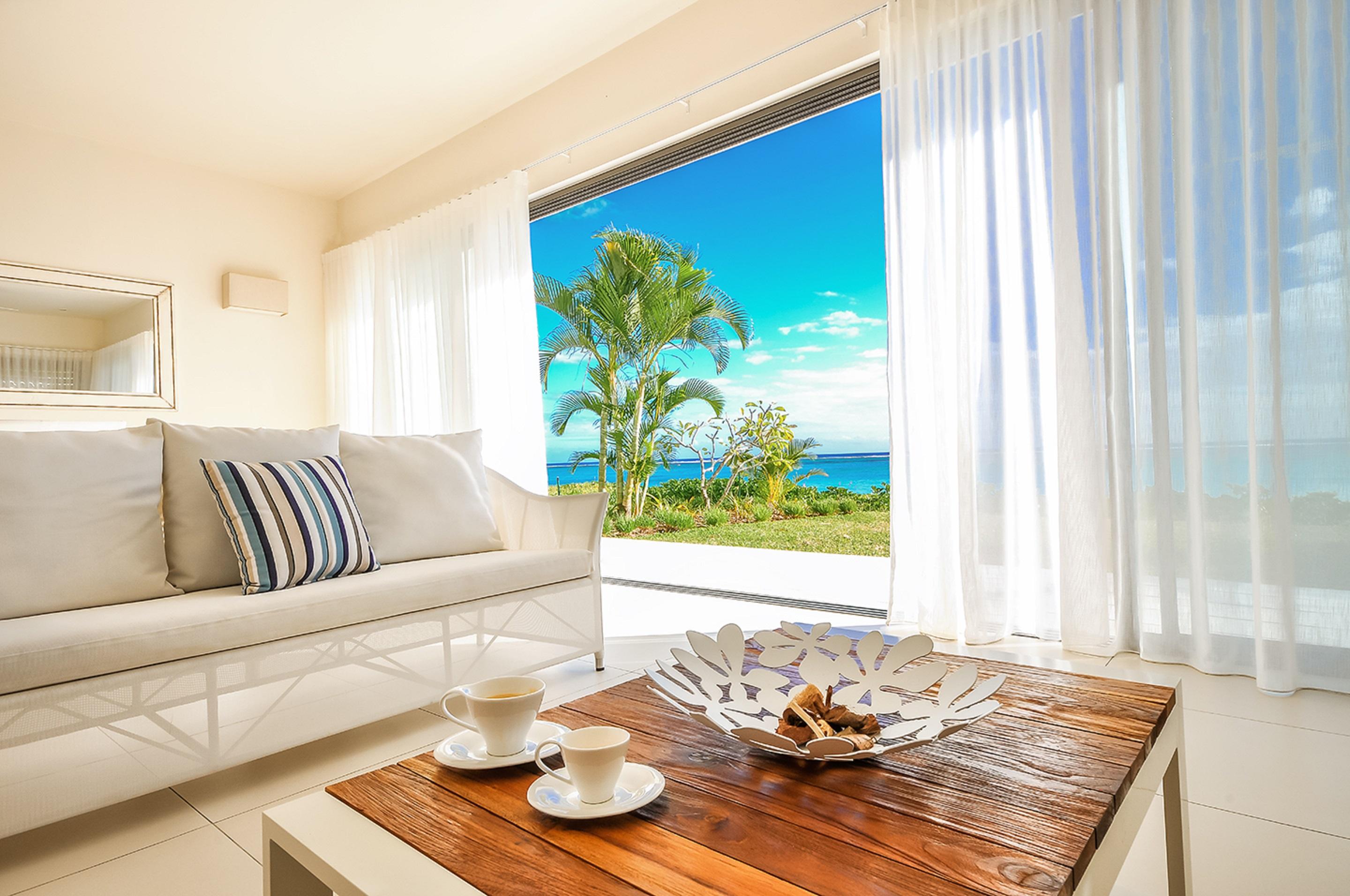 Cap Ouest: Luxury Beachfront Apartments Flic en Flac Luaran gambar