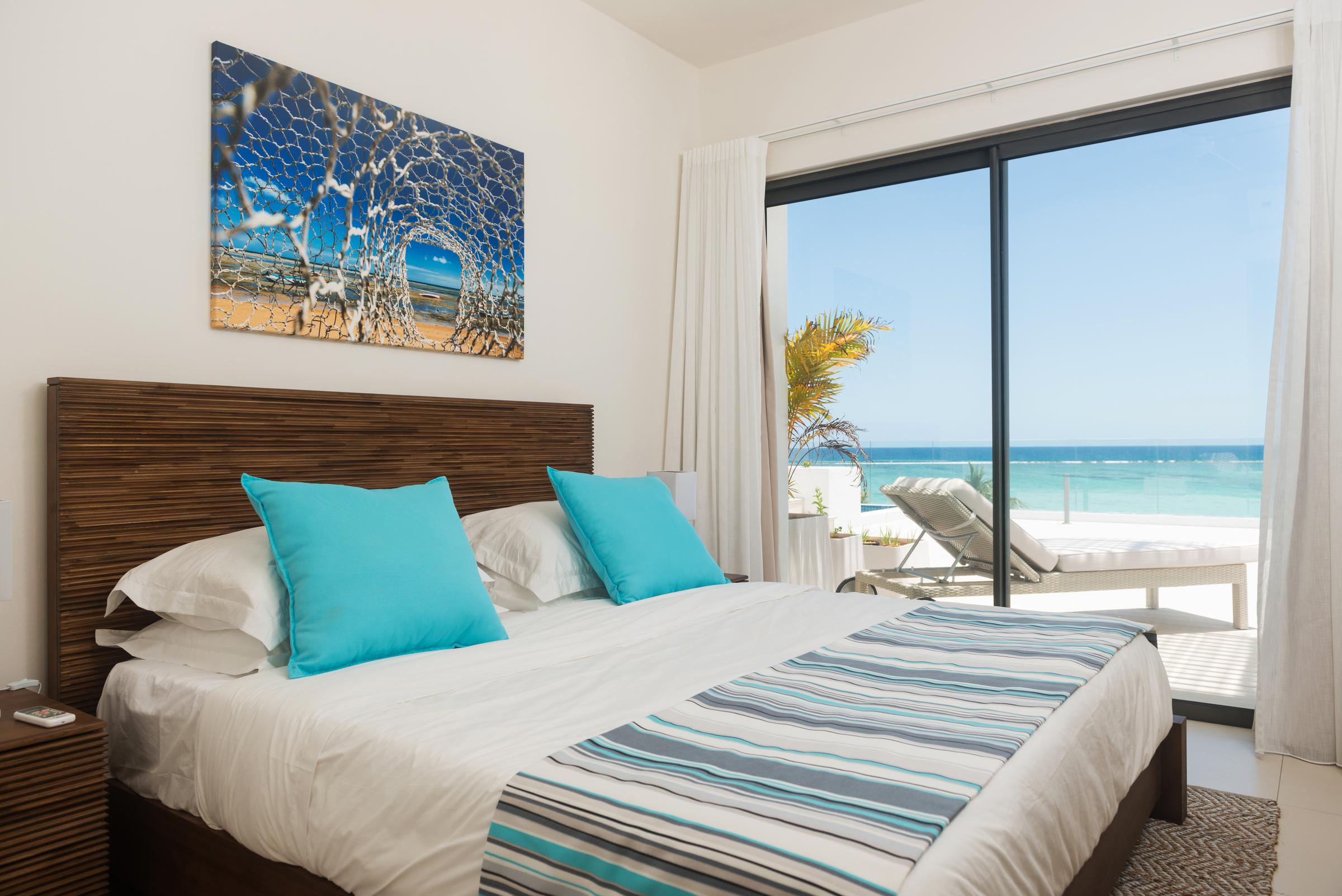 Cap Ouest: Luxury Beachfront Apartments Flic en Flac Luaran gambar